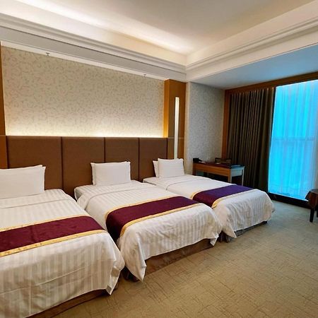 Happiness Inn Hotel Синьчжуан Экстерьер фото