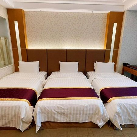 Happiness Inn Hotel Синьчжуан Экстерьер фото