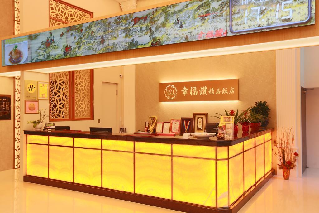 Happiness Inn Hotel Синьчжуан Экстерьер фото
