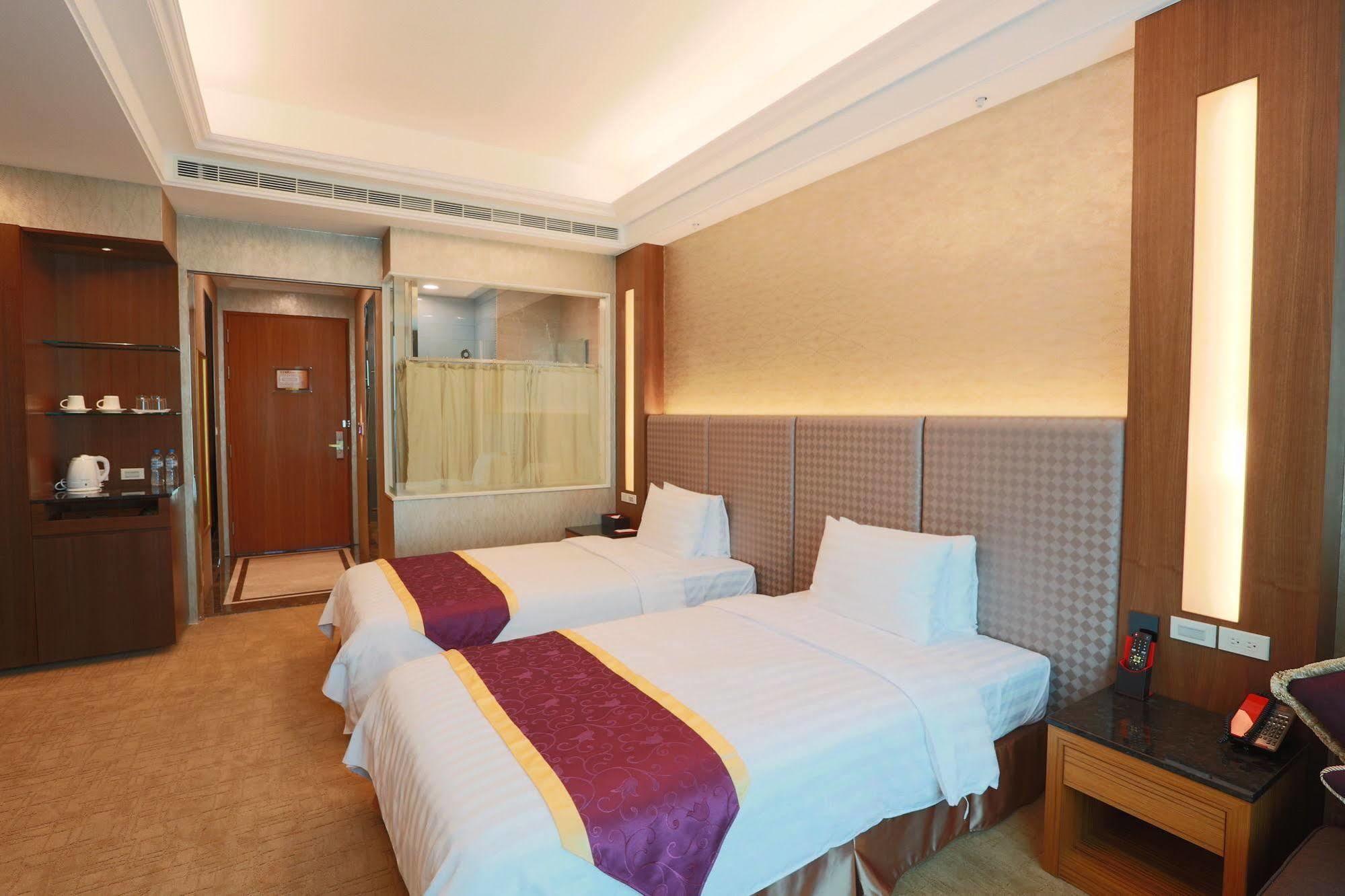Happiness Inn Hotel Синьчжуан Экстерьер фото
